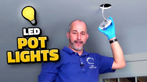 Most models of recessed light housing have four clips that clamp the can to the ceiling by pushing down on top of the drywall. How To Install Pot Lights In Kitchen Ceiling Youtube