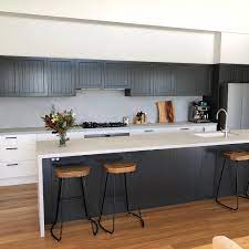Make the legs yourself or purchase prefabricated legs (just make sure you measure the height from floor to bottom of cabinet) then install them beneath the cabinet in the toe kick space. D L Custom Cabinets Home Facebook