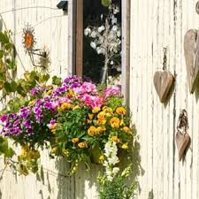 50jobsforspring 35 Paint The Shed Turn Your Shed Into A Garden Feature Try Alternating The Colours Of The Slats For A Garden Features Garden Insect Hotel