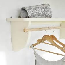 There's a great example of this idea in architect anna castles' australian home. Wall Mounted Clothes Rails Housecraft