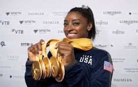 How tall is simone biles? Simone Biles Becomes World Championships Most Decorated Gymnast The New York Times