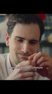 Guy Eats Fortune Cookie