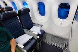 Premium leather seat with extra space and comfort, featuring a headrest that adjusts 6 ways storage space for personal items United Airlines 787 9 Economy Plus Lax To Nrt Traveling Tee Times