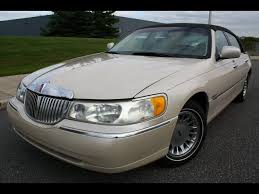 Image result for Light Parchment Gold 1999 Town Car