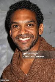 Director Rick Morales and Actor James Arnold Taylor sign a poster at...  News Photo