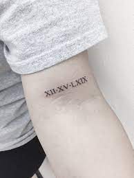 Simple roman numerals tattoo on wrist. Roman Numerals On Bicep Tattoo Roman Numeral Wrist Tattoo Bicep Tattoo Roman Tattoo