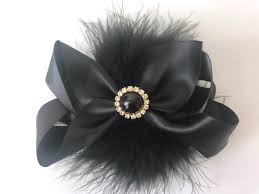 Gorgeous black and gold hair bow, fastened by a subtle matching hair grip, this is a cheap way to jazz up your hair for a funky and fashionable look. Black Hair Clip Black Gold Hair Bow Black Satin Hair Clip Gold Crystal Feather Bow Red Black Hair Clip Hunter Green Gold Hair Clip