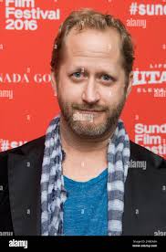 Executive producer Jonathan Helmuth poses at the premiere of "Outlaws and  Angels" during the 2016 Sundance Film Festival