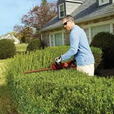 Black And Decker Electric Hedge Trimmer Black Decker 24 In 3 3 Amp Corded Electric Hedge Hog Trimmer With Rotating Handle Hh2455 The Home Depot Best Garden Tools Hedge Trimmers Trimmers