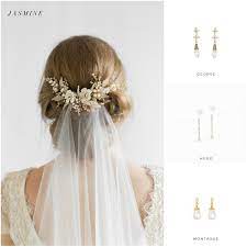 4,633 likes · 23 talking about this · 17 were here. Jasmine Floral Wedding Hair Comb Tania Maras Bespoke Wedding Headpieces Wedding Veils