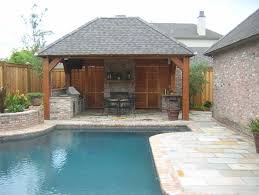 Cabana with a thatched roof. Pool Cabana Traditional Pool New Orleans By Ferris Land Design Houzz