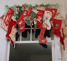 Great Way To Display Vintage Stocking Collection Vintage Christmas Stockings Retro Christmas Decorations Vintage Christmas