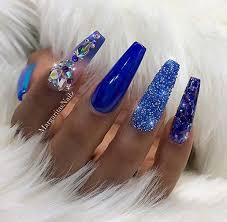 The nail art is filled with stripes and cute blue anchor painted atop a white polish base color that simple stands out endearingly. 23 Chic Blue Nail Designs You Will Want To Try Asap Page 2 Of 2 Stayglam