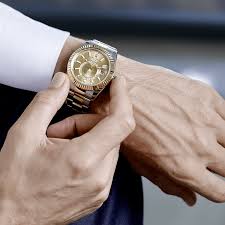 The Rolex Sky Dweller In Steel And Yellow Gold 42 Mm Case Champagne Colour Dial Oyster Bracelet The Sophisticated Trave Rolex Watches Traveller Watch Rolex