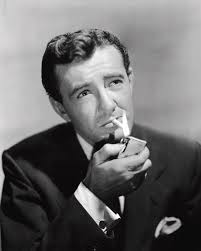 ROBERT WALKER in STRANGERS ON A TRAIN -1951-, directed by ALFRED HITCHCOCK.  by Album