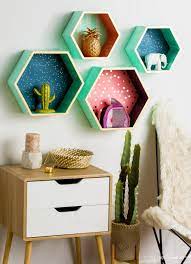 These crafts are perfect if you're looking for a quick revamp or just want to change it up. Make Your Shelves Go From Holding Decor To Being Decor With Poster Board Bedroom Diy Home Diy Diy Home Decor