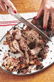 To make this roast pork shoulder recipe, you peel back the skin and make incisions in the meat, which allows the garlicky marinade to seep in. Easy Fall Apart Roasted Pork Shoulder Recipe The Mom 100