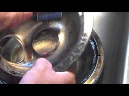 After a few hours at a heat of 500ºf, the grim will incinerate to a white dust which is easily cleaned off. The Easy Way To Clean Stove Drip Pans Youtube