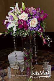 Maybe you would like to learn more about one of these? Tall Wedding Centerpiece In Purples Mancusosweddings Com Wedding Flowers Detroit Mi Colorful Wedding Flowers Wedding Reception Centerpieces Floral Wedding