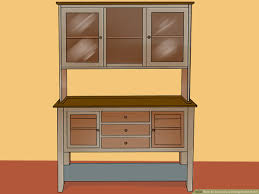 White oak, maple and rustic cherry solid woods that are known for their ability to retain their beauty through many generations of use. 4 Ways To Decorate A Dining Room Hutch Wikihow