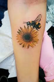 Celebrate The Beauty Of Nature With These Inspirational Sunflower Tattoos Sunflower Foot Tattoos Sunflower Tattoos Sunflower Tattoo Small