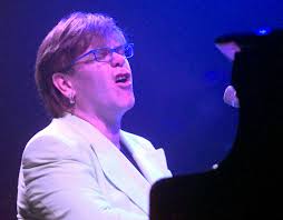 Elton John plays Louisville through the years