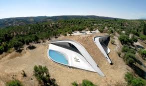 Futuristic Villa Frames Stunning Mountain Sea Views In Greece Curbedclockmenumore Arrow It Also Looks Ra Underground Homes Greek Villas Green Architecture