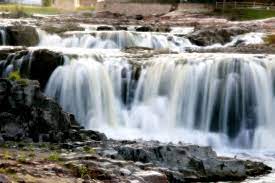 Falls park is a public park located in north central sioux falls, south dakota, surrounding the city's falls. Falls Park Travel South Dakota