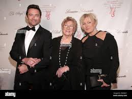 From left, actor Hugh Jackman, his mother-in-law Fay Duncan and wife  Deborra-Lee Furness attend Angel Ball 2013