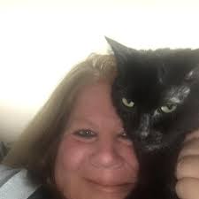 Mom of two beautiful females n my handsome son in one picture lol black n  white one is sissy Mae n the other is carmel marie