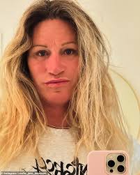 Surfing competition is bullied into allowing transgender woman to take part  after facing furious backlash over ban