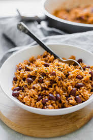 My version of my family's today i'm sharing a recipe for habichuelas guisadas (stewed beans) that we almost always make with the arroz. Spanish Rice Beans Jar Of Lemons