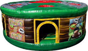Tables, chairs and concessions for rent. Human Whack A Mole Inflatable Rental