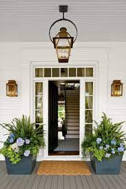 This modern front door has a flat panel design with thin horizontal stainless steel strips and matching hinges, pole handle and door locks. 75 Beautiful Front Door Pictures Ideas July 2021 Houzz