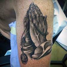 The truth behind this tattoo is that it actually stands for the meaning of peace. 52 Rosary Tattoos For Men