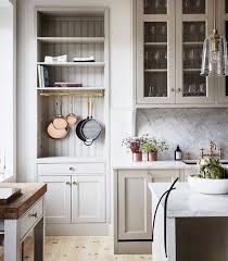 Warm Putty Gray Painted Kitchen Cabinets Beadboard And Marble Backsplash In A Gorgeous Classic Kitchen Kitchen Renovation Kitchen Design New Kitchen Cabinets