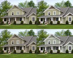 House exterior with sage green color and grey stone material combination. Exterior House Colors Exterior Paint Colors For House House Paint Exterior