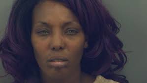 Woman arrested after chasing two people and firing a gun