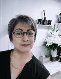 Family cooking chicken breast for dinner