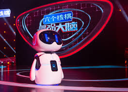 Wang feng & huang qishan singing the same song (waiting) on singer china. In China Ai Robot Takes On Humans In Reality Tv Show