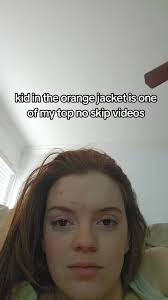 Little Kid in Orange Shirt