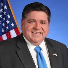 Governor J.B. Pritzker talks to the Crusader