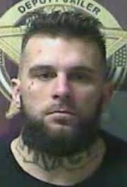 Four indicted for allegedly sodomizing, robbing inmates