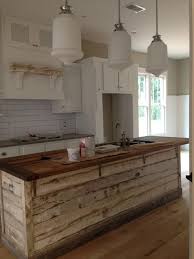 Dark granite countertop looked as modern design, while the rustic elements got from wall panel on the backsplash. 30 Rustic Countertops That Add Coziness To Your Home Digsdigs