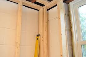 You'll frame your walls using 2 x 4. Finishing A Basement Day 1 Framing The Walls