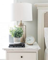 Bedside tables — style consider whether you need two coordinating end tables or differentiating ones. His And Her Nightstand Decor Ideas From Sifted Style Nightstand Decor Bedroom Night Stands Bedroom Nightstand Decor