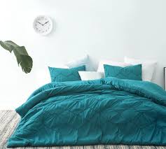 This set features blue and grey stripes with a heather effect and. Extra Large King Comforter In Fashionable Teal Blue Textured Material With Stylish Matching Shams