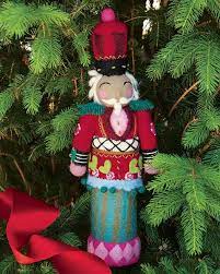 Soft wool, tree fiber, and the world's first sugarcane eva foam. Felted Nutcracker Tree Topper Olive Cocoa