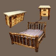 One main floor bedroom features a queen bed with sunrise views ideal for your guests. Aspen Grizzly Log Bedroom Set Log Cabin Rustics