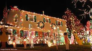 The simple apple swag pays tribute to the orchard outside. 4 Safety Tips For Christmas Decorations On Your Roof Applied Roofing